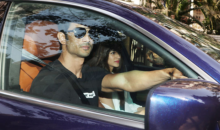  sushant singh rajput in maserati quattroporte with kriti sanon